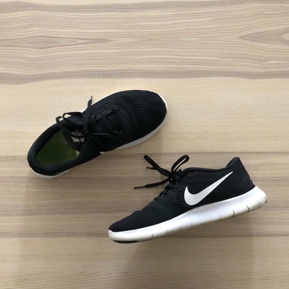 Black and white Nike Free RN